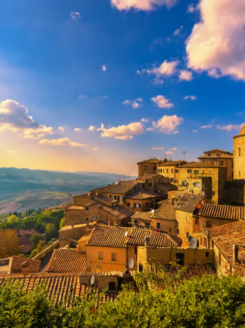 Tuscany Volterra town skyline church and panorama view on sunset Italy